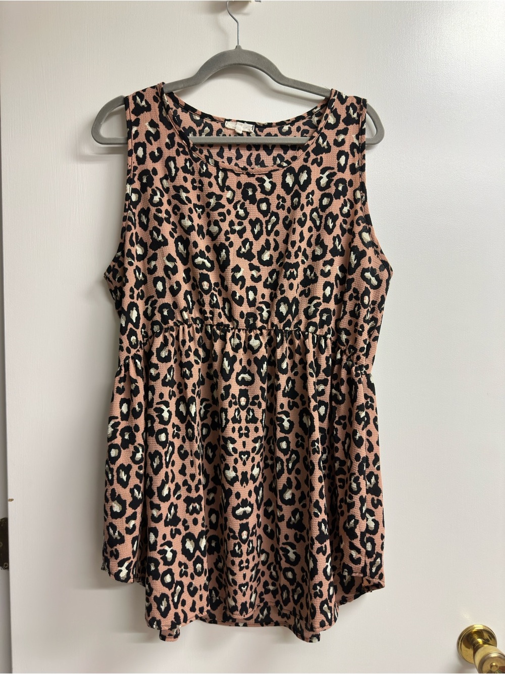 Sleeveless Pink Leopard Print Peplum Top